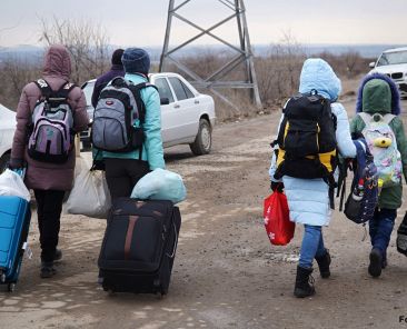 A scene from the Reni-Cahul border crossing point, between the Republic of Moldova and Ukraine on 3 March 2022. People flee the military offensive in Ukraine, seeking refuge in Moldova or transiting the country on their way to Romania and other EU countries. Pictured: Photo: UN Women Produced by UN Women Moldova