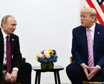 US President Donald Trump (R) attends a meeting with Russia's President Vladimir Putin during the G20 summit in Osaka on June 28, 2019. (Photo by Brendan Smialowski / AFP)