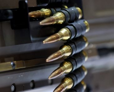 DALLAS, TEXAS - MAY 17: Ammunition hangs from a gun displayed at the Sig Sauer booth during the National Rifle Association (NRA) Annual Meeting & Exhibits at the Kay Bailey Hutchison Convention Center on May 17, 2024 in Dallas, Texas. The National Rifle Association's annual meeting and exhibit runs through Sunday. Justin Sullivan/Getty Images/AFP (Photo by JUSTIN SULLIVAN / GETTY IMAGES NORTH AMERICA / Getty Images via AFP)