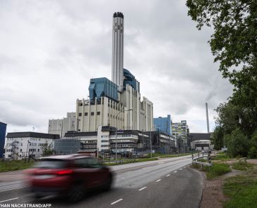 A general view taken on August 11, 2023 shows the M‰larenergi Power Plant in V‰steras, Sweden. M‰larenergi, a Swedish energy company that provides various energy services to the region surrounding Lake M‰laren, is repurposing a former oil storage cavern into a massive energy storage facility for district heating, set to become Europe's largest hot water storage at temperatures reaching 95 degrees Celsius, with a capacity of 300,000 cubic meters, upon its 2024 completion. (Photo by Jonathan NACKSTRAND / AFP)