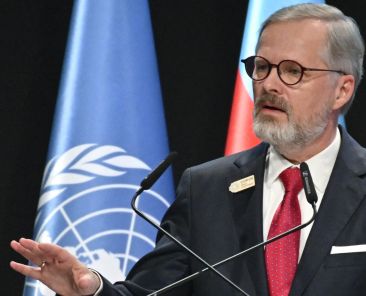 Czech Republic's Prime Minister Petr Fiala gives a speech during the United Nations Climate Change Conference (COP29) in Baku on November 13, 2024. (Photo by Alexander NEMENOV / AFP)